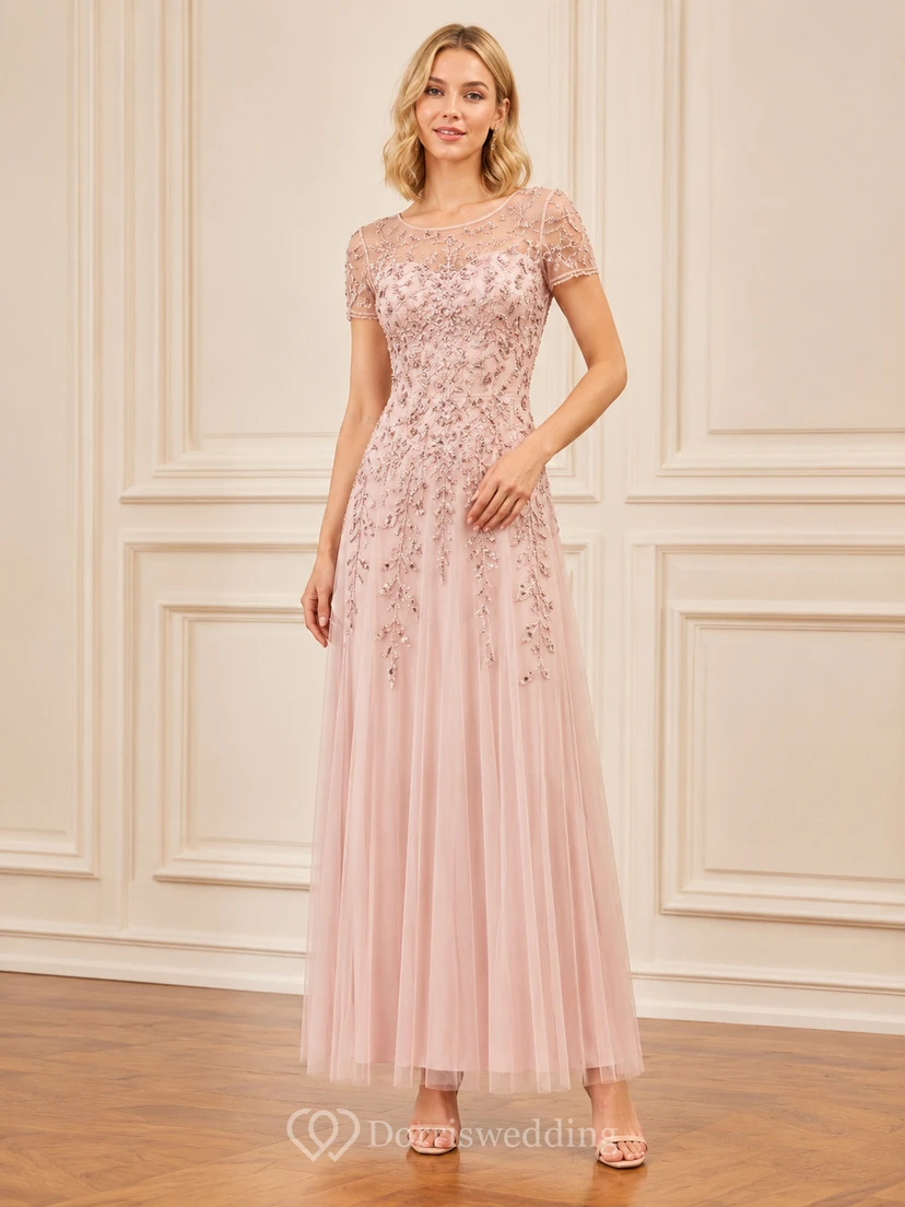 Robe en tulle rose poudré à manches courtes et corsage en dentelle, longueur thé