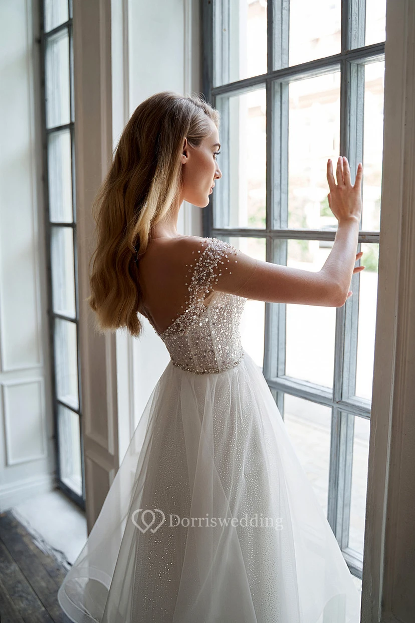 Vestido de novia de gasa con corte en A y detalles de pedrería, estilo Imperio Brillante. view 4