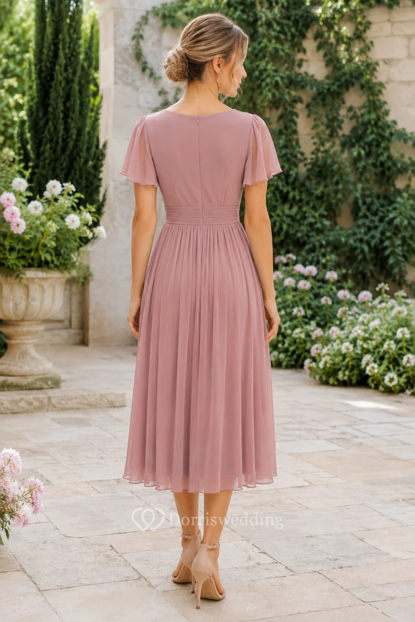 Robe trapèze en mousseline rose poudré à col en V et longueur thé view 2