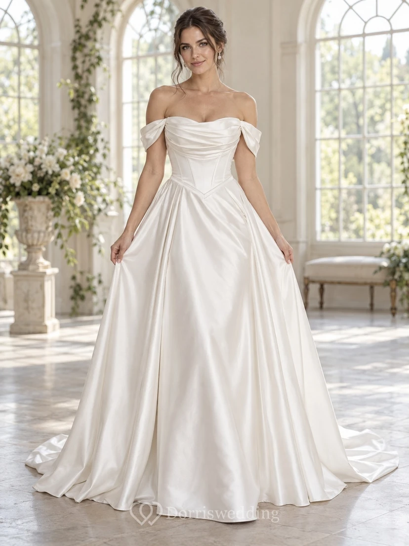 Vestido de novia sencillo de satén con escote Bardot, cintura drapeada y cola de capilla.