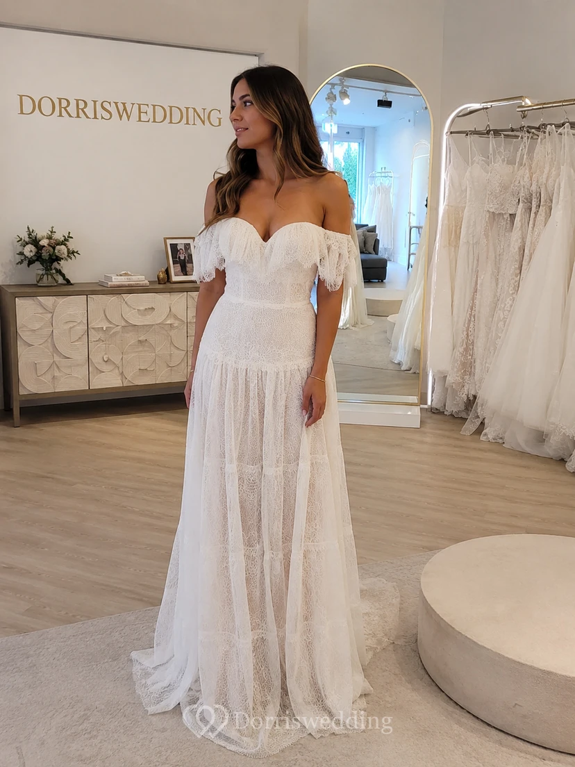 Vestido de novia bohemio de talla grande con hombros descubiertos, volantes y encaje con flecos view 6