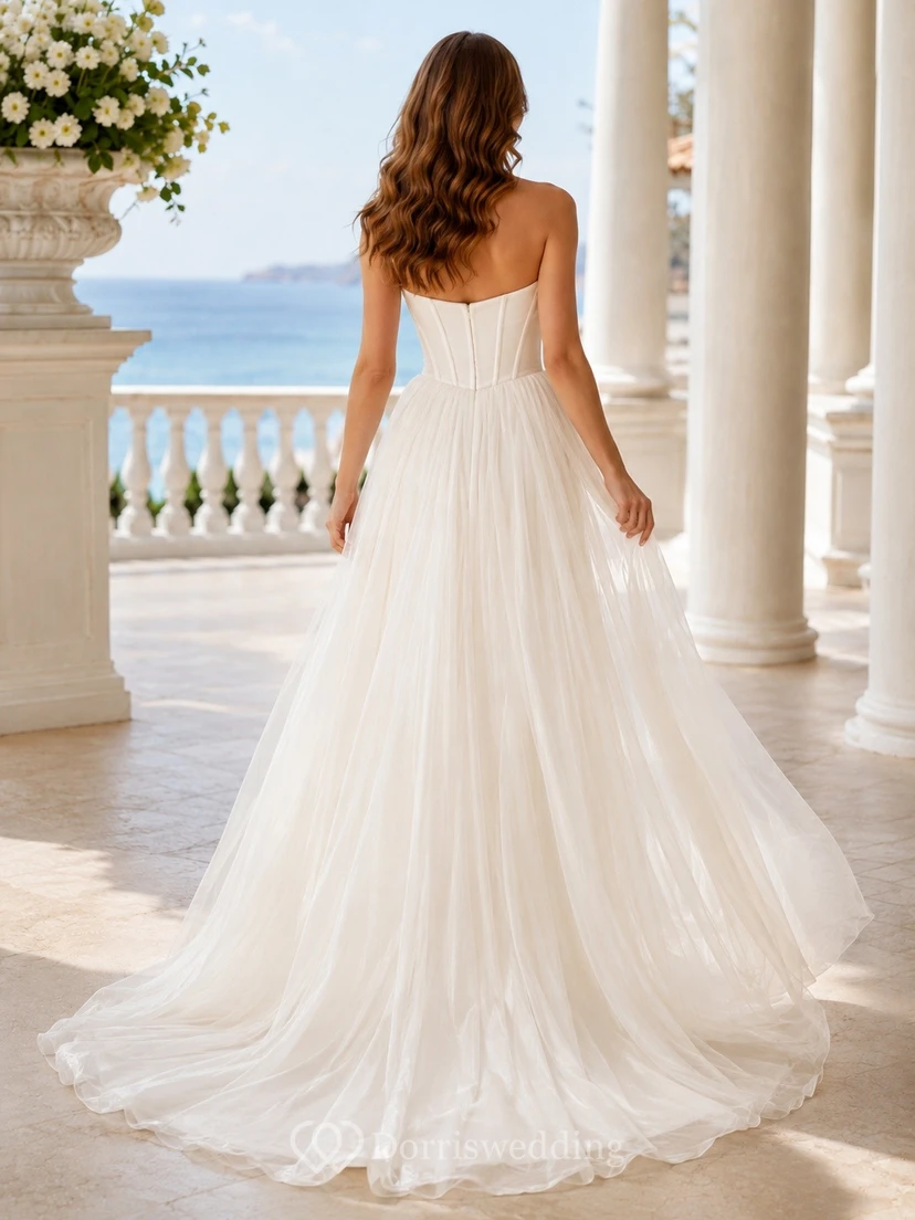 Vestido de novia sencillo sin tirantes con corsé y falda transparente desmontable, corte en A. view 2
