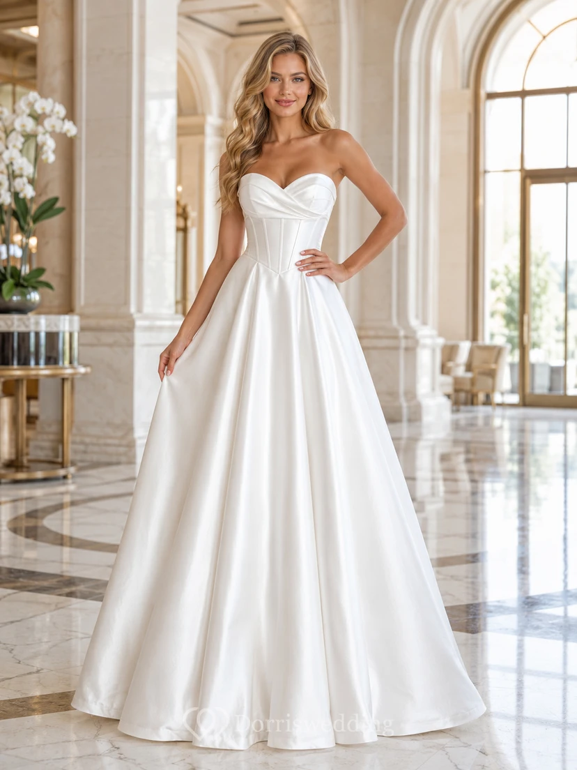 Robe de bal blanche de luxe sans bretelles en satin à décolleté cœur, idéale pour une cérémonie civile.