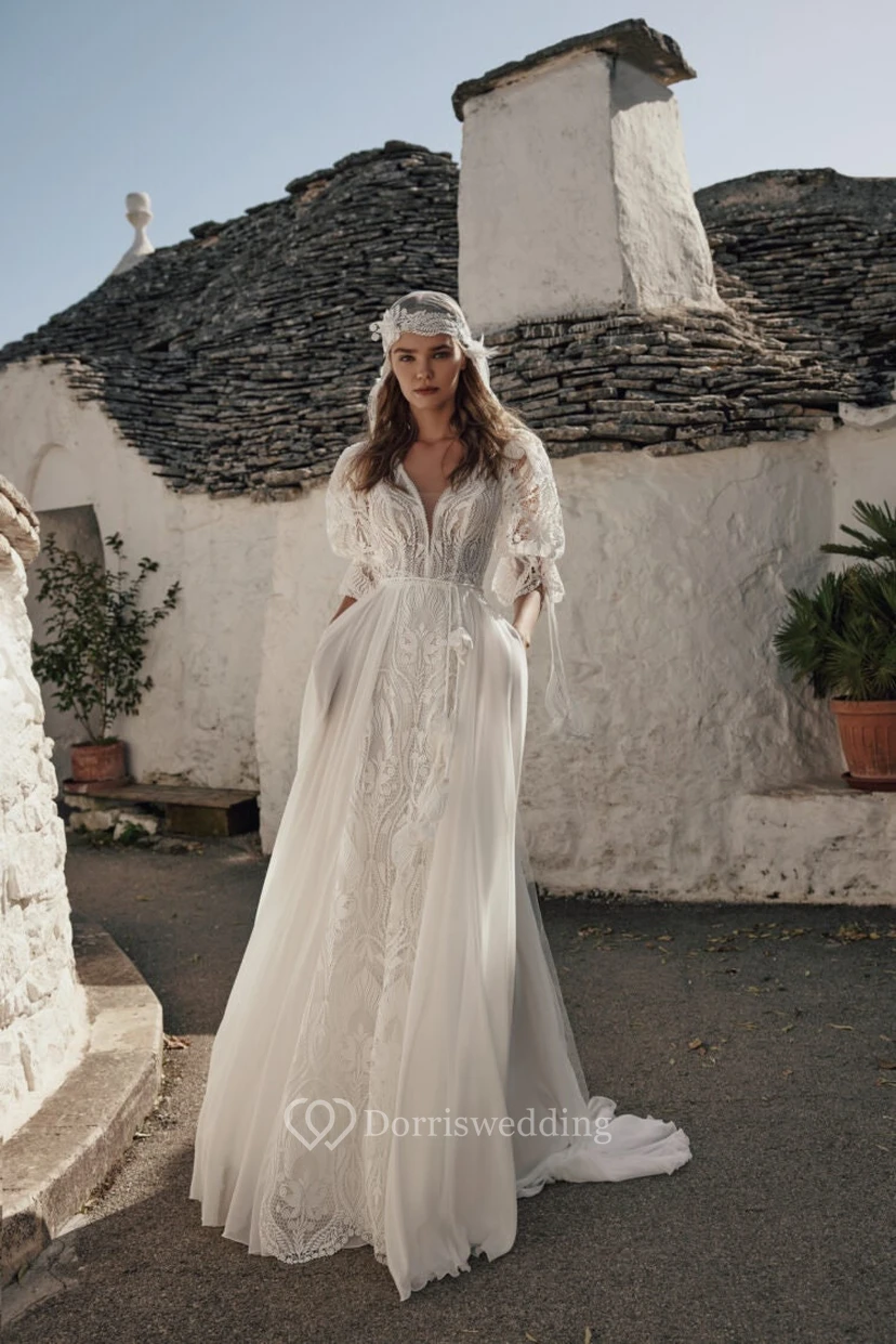 Robe de mariée d'été bohème à manches bouffantes, style empire, en mousseline et dentelle.