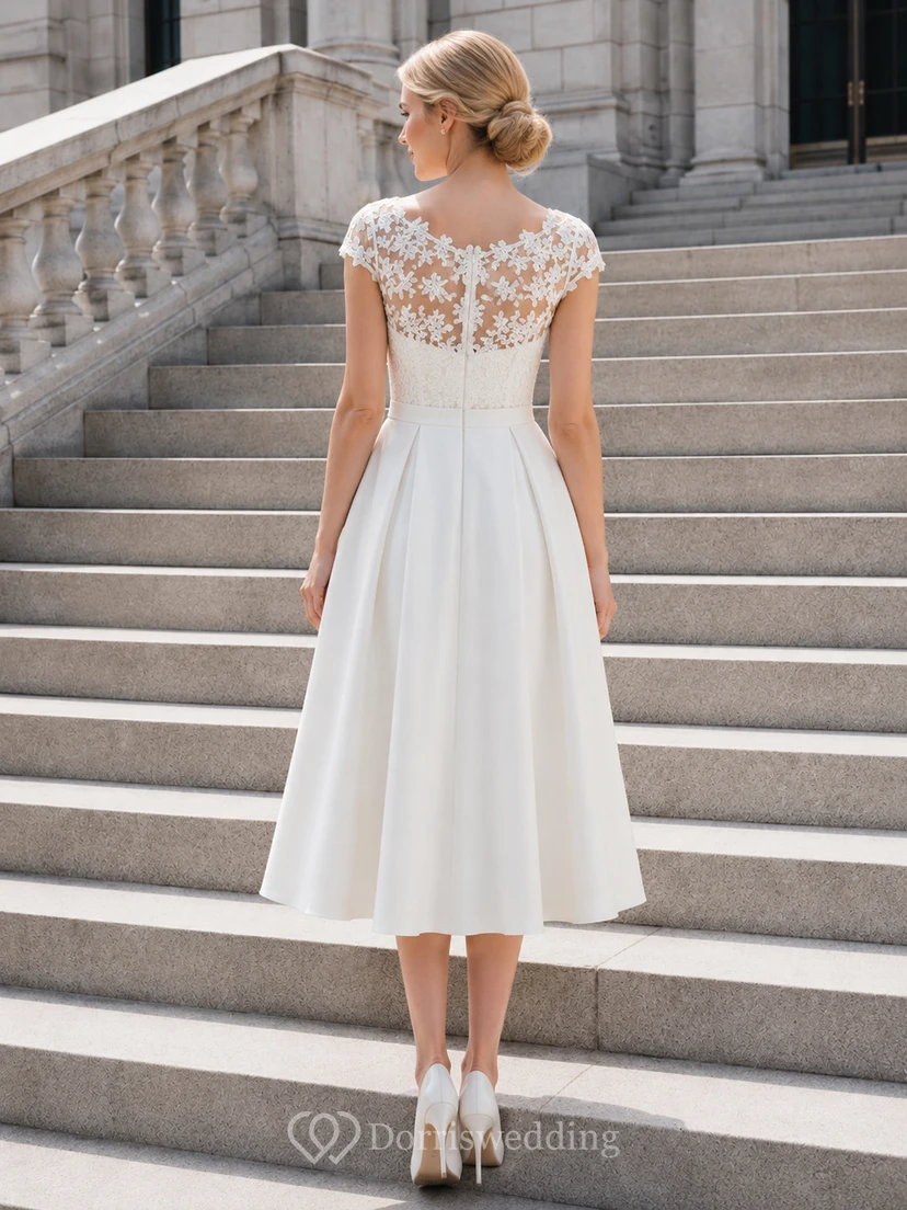 Vestido de novia midi de corte A con corpiño de encaje y efecto ilusión, estilo juzgado. view 2