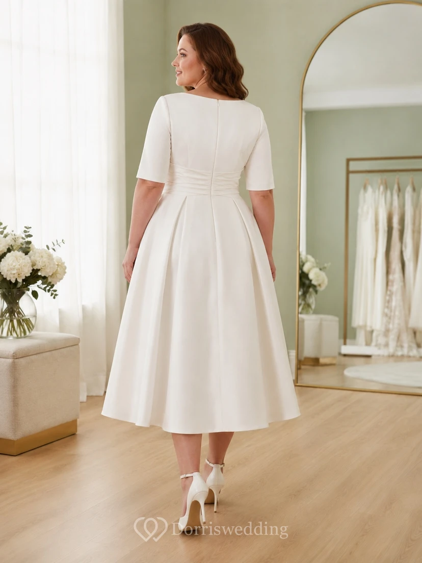 Schlichtes, elegantes Brautkleid in Übergröße mit Teelänge, U-Boot-Ausschnitt, halben Ärmeln und A-Linien-Schnitt aus Satin view 2