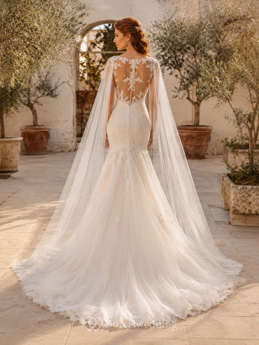 Robe de mariée élégante en dentelle et tulle, épaules dénudées, manches cape, traîne chapelle et dos illusion view 2