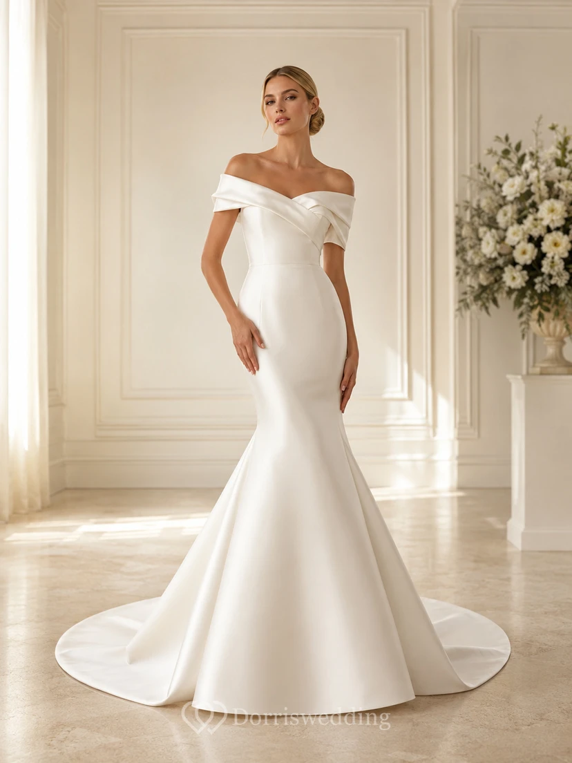 Robe de mariée classique moderne en satin satiné, épaules dénudées, coupe sirène courte, plis et ourlet plissé.
