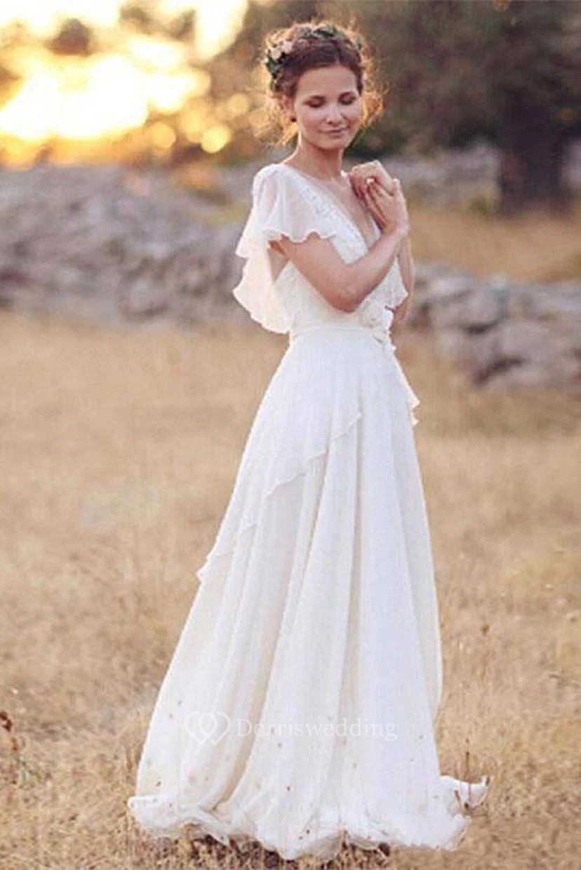 Brautkleid aus Chiffon mit böhmischer Perlenstickerei, tiefem V-Ausschnitt, rückenfreiem Design, Blumenstickerei, transparenten Ärmeln und Falten im Boho-Stil video preview