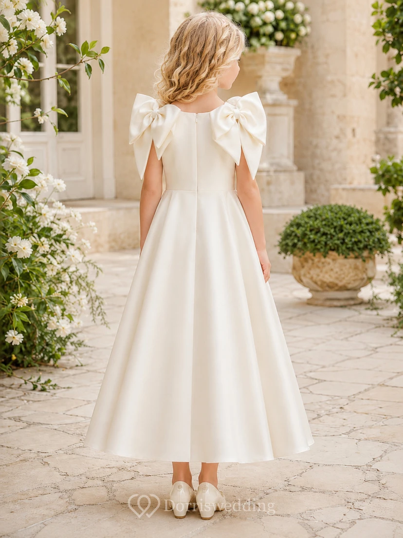 Vestido de niña de flores de satén color marfil con lazo escultural, corte en A, sin mangas, cuello joya, largo hasta la rodilla, para bodas y fiestas. view 2