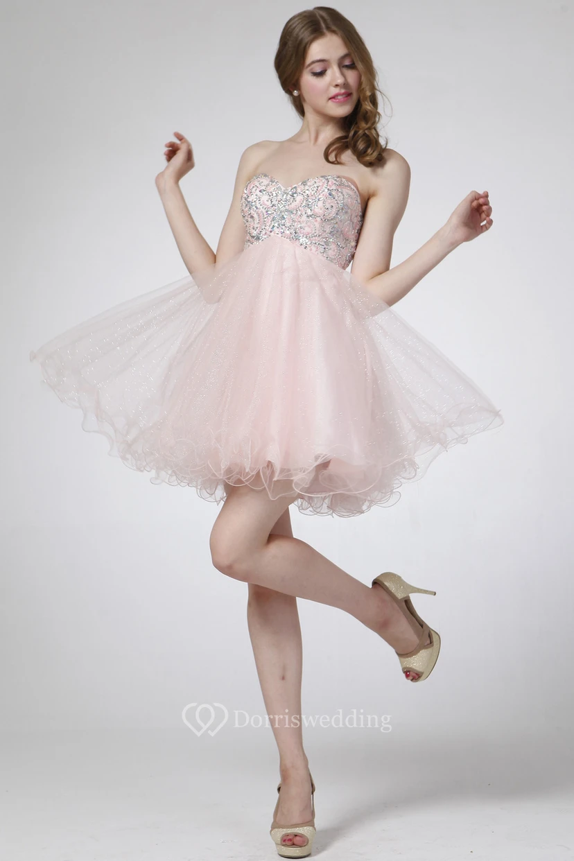 Robe trapèze mini bustier cœur sans manches en tulle empire ornée de perles