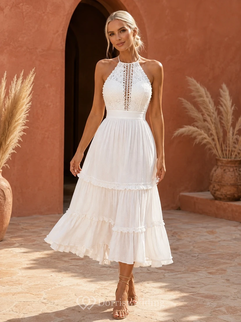 Weißes, ärmelloses Cocktailkleid aus Tüll mit Schlüssellochausschnitt, Neckholder und A-Linien-Schnitt in Teelänge und Stufenrock