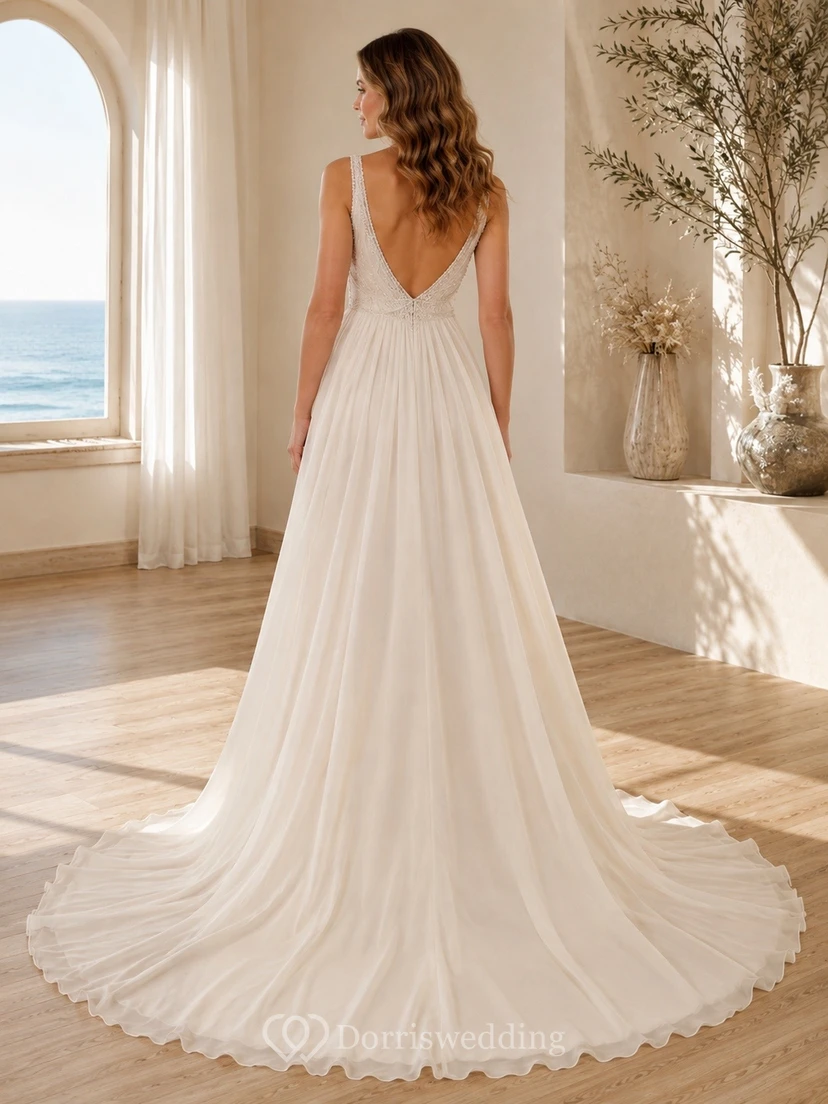 Vestido de novia playero de corte A con escote en V y cola fluida view 2