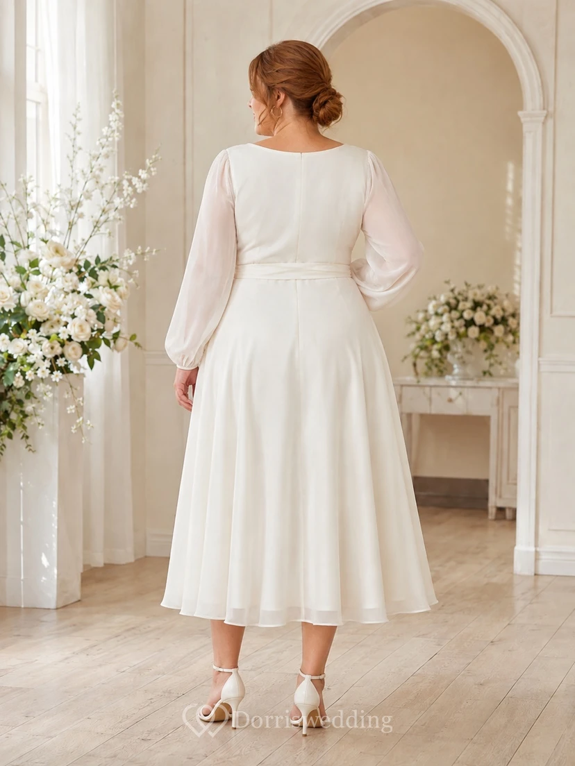 Brautkleid in Übergröße aus Satin mit Wickeloptik, V-Ausschnitt, langen Ärmeln, Schärpe, A-Linie und Teelänge view 2