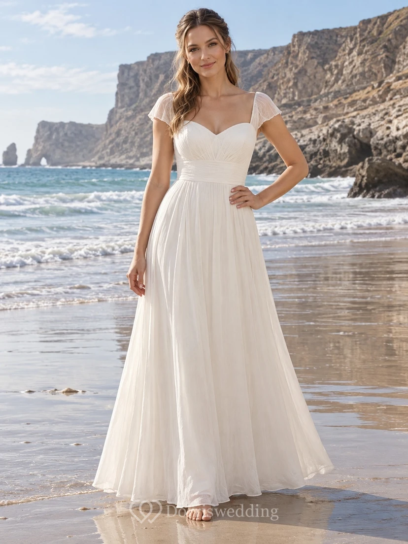 Vestido de novia sencillo de gasa fruncida con mangas cortas y escote corazón, largo hasta el suelo.