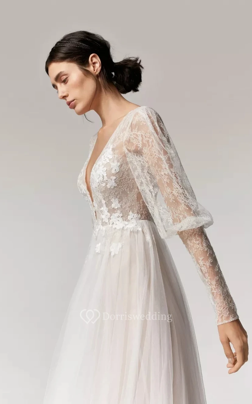 Vestido de novia bohemio de corte A con escote pronunciado, mangas largas abullonadas y falda de tul. view 4
