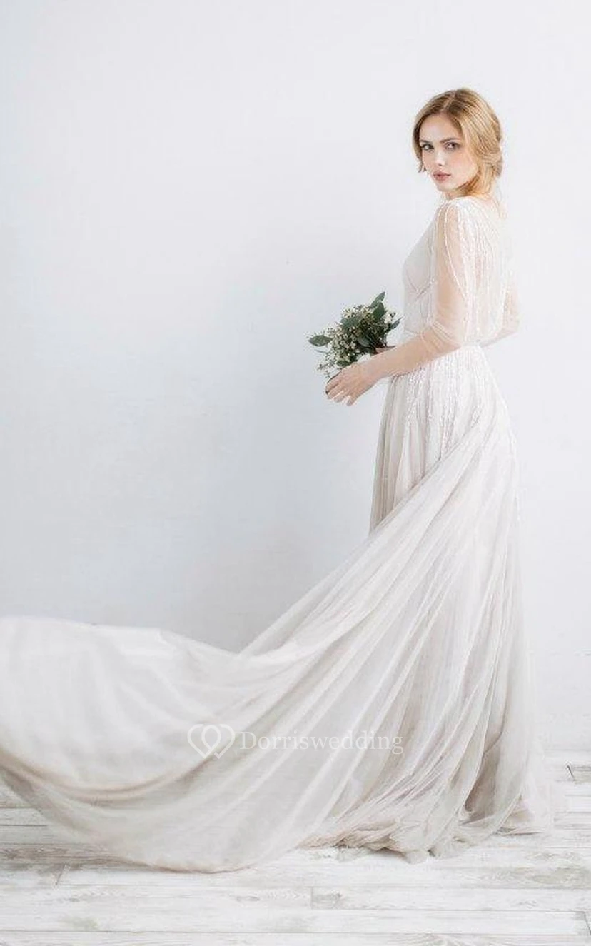 Robe de mariée en tulle illusion à manches longues et col en V ornée de perles view 2