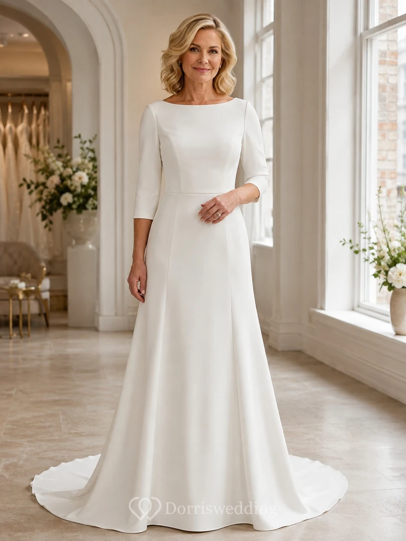 Vestido de novia de satén con mangas tres cuartos, corte en A y cola larga.