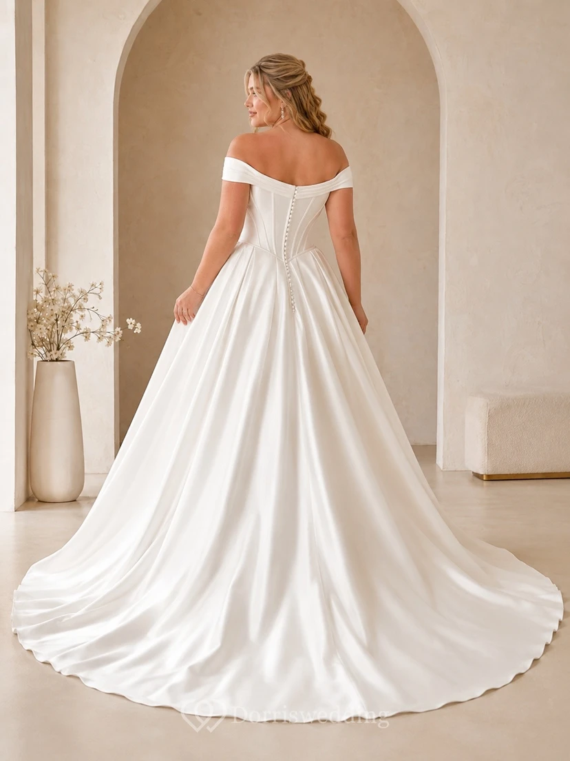 Vestido de novia de satén de manga corta con hombros descubiertos y cola larga. view 2