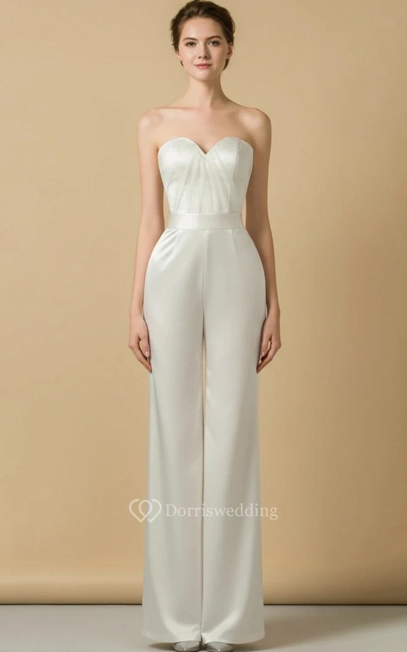 Mono de novia sin tirantes con escote corazón y falda de tul plisado de múltiples capas. view 3