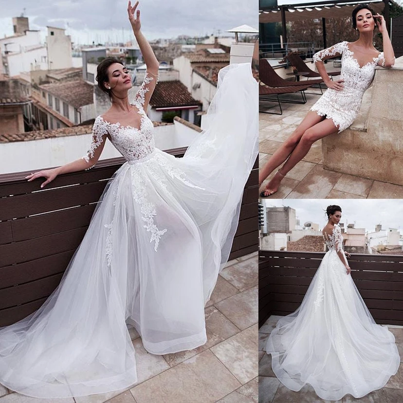 Robe de mariée en tulle vaporeux à manches mi-longues et dentelle, ornée d'appliqués et d'appliqués, avec traîne amovible. view 5
