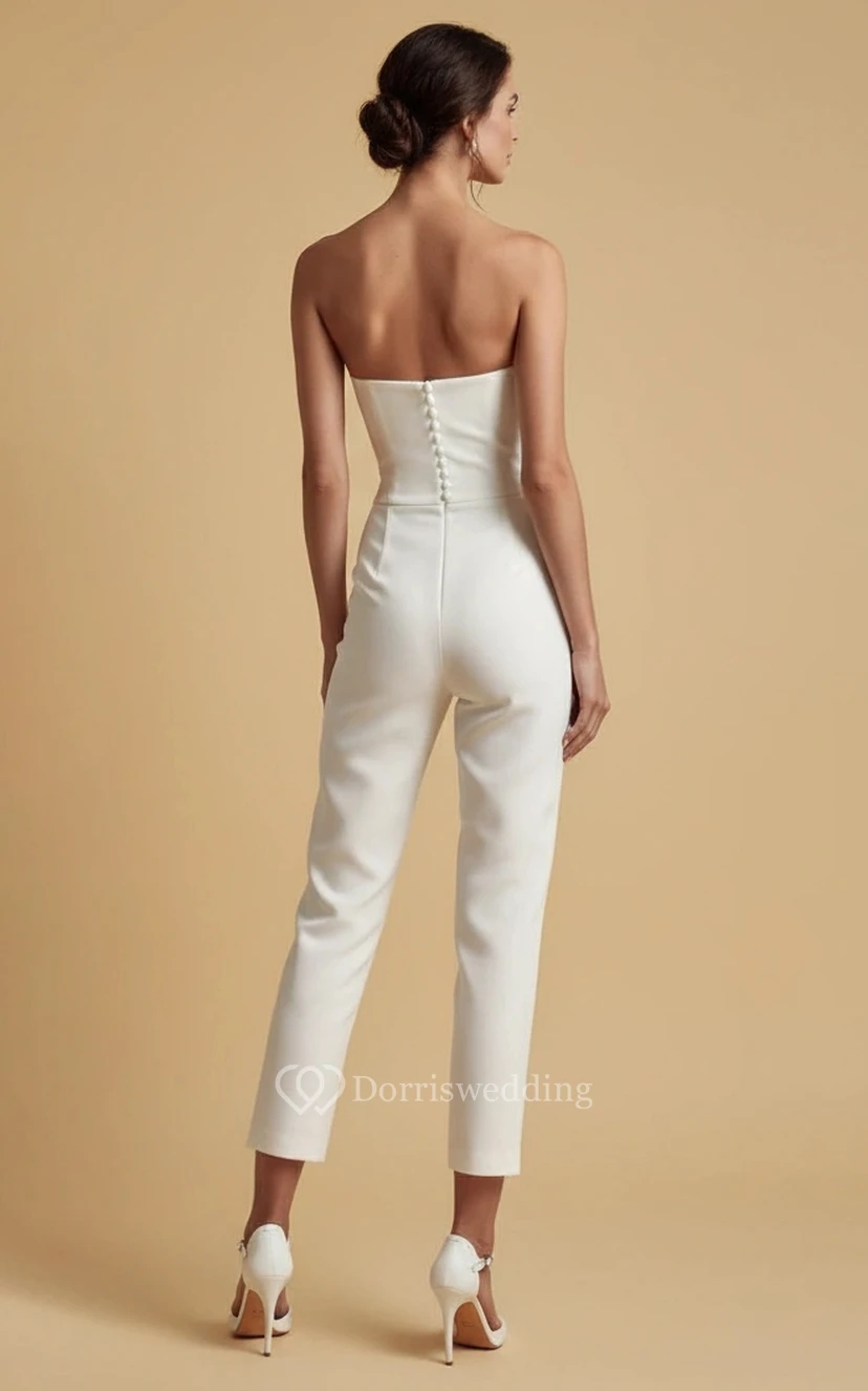 Mono de novia sin tirantes con cintura fina, talle alto y pernera ancha, con falda de tul. view 4