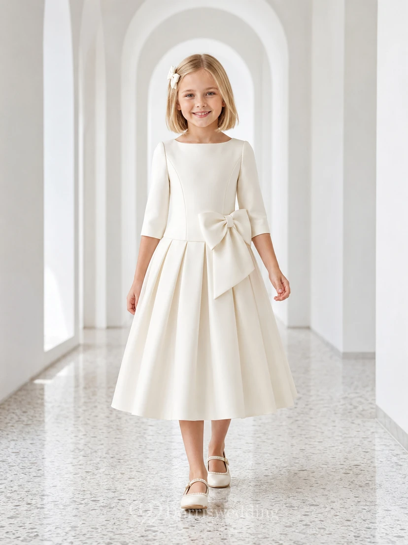 Vestido de té de comunión moderno con lazo y mangas tres cuartos estilo barco.
