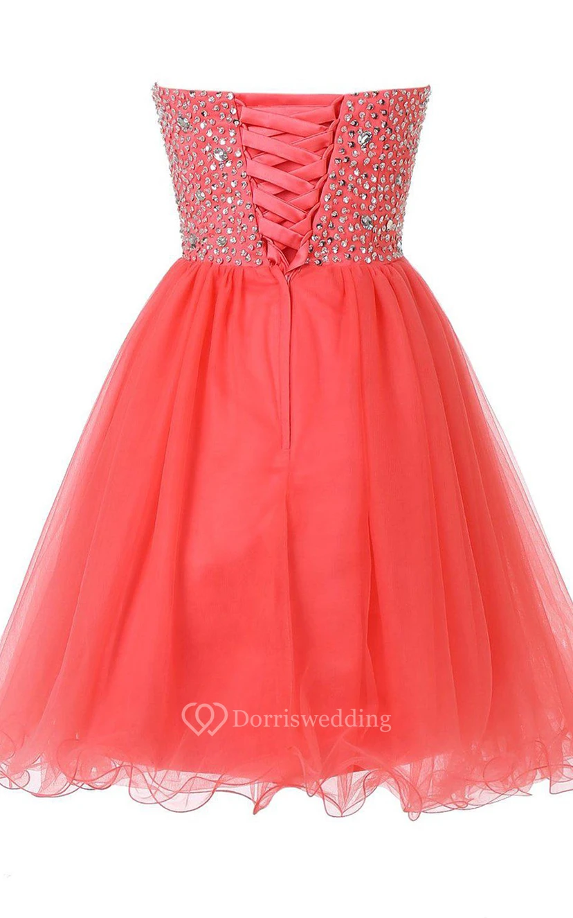 Robe courte bustier trapèze à corsage à sequins view 4