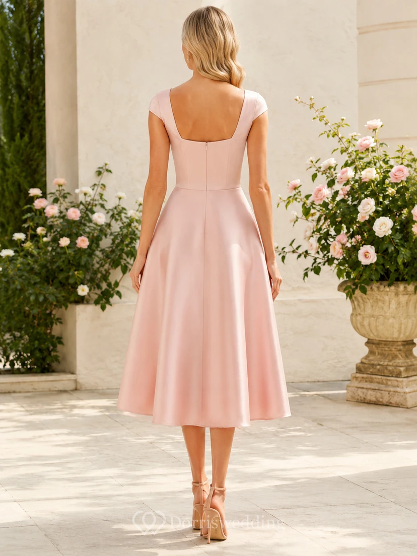 Vestido de cóctel rosa palo con escote Bardot y largo midi view 2