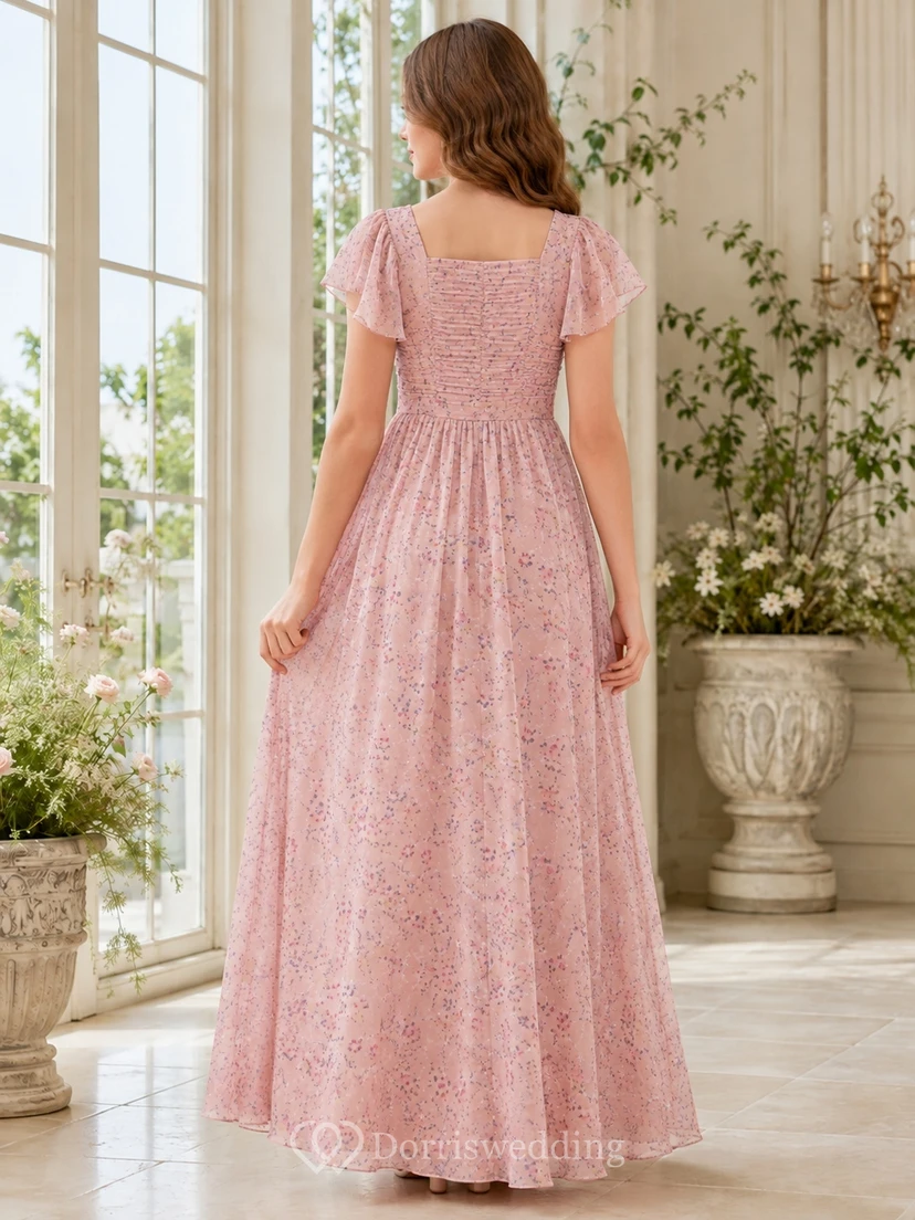 Zartrosa Brautjungfernkleid im A-Linien-Stil mit Rundhalsausschnitt, kurzen Ärmeln und floralem Blütenmuster im Boho-Stil view 2