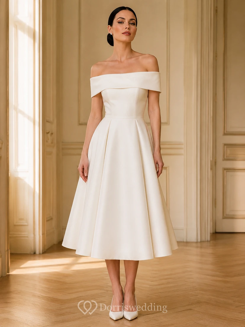Robe de mariée civile vintage en satin, coupe trapèze, manches courtes, épaules dénudées, longueur thé, idéale pour une cérémonie civile à la mairie.