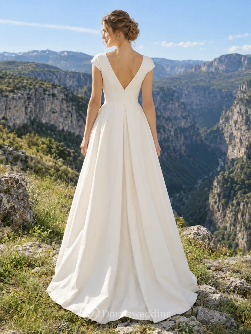 Vestido de novia sencillo, largo hasta el suelo, con escote en V pronunciado, mangas cortas y pliegues, corte en A. view 2