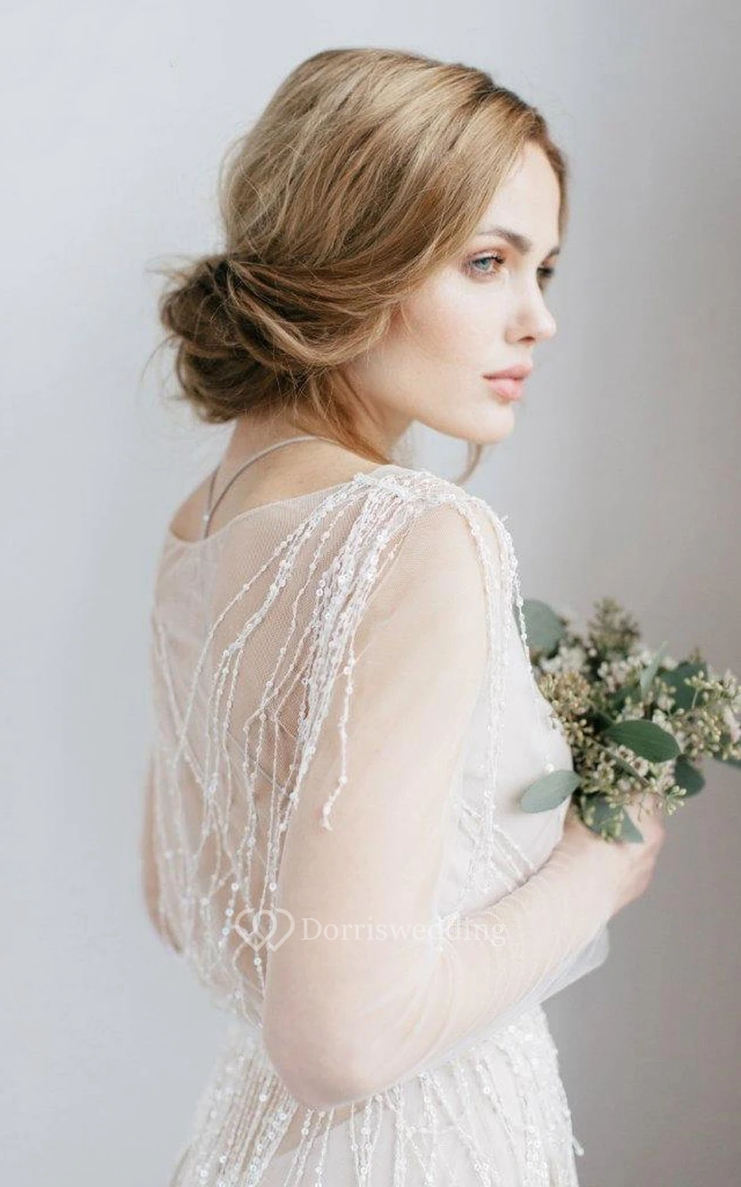 Robe de mariée en tulle illusion à manches longues et col en V ornée de perles view 3