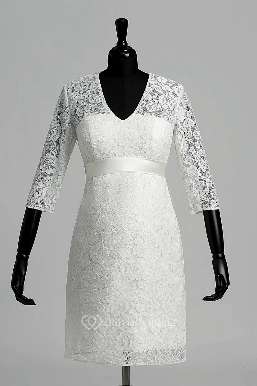 Robe de mariée en dentelle, coupe trapèze, col en V, manches illusion 3/4, longueur genou. view 11