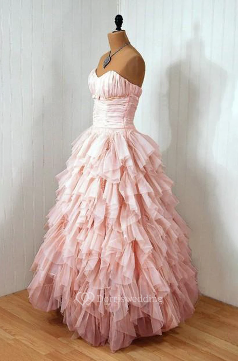 Precioso vestido de fiesta de tul con escote corazón y volantes hasta el suelo. view 12