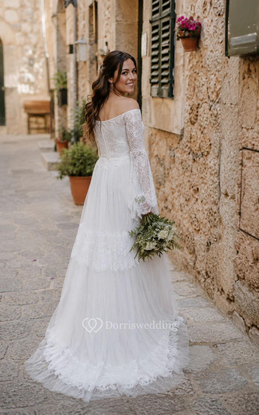 Robe de mariée ivoire à épaules dénudées, manches longues et dentelle à volants view 10