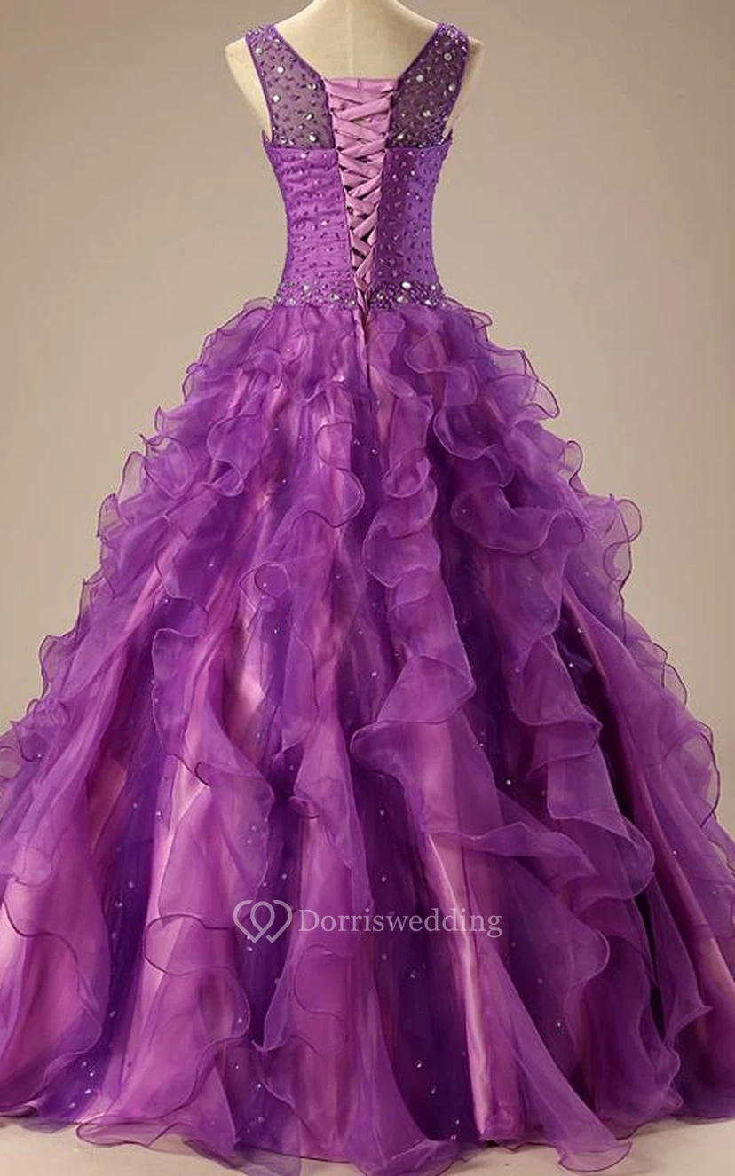 Vestido de gala largo hasta el suelo, sin mangas, con pedrería, corsé, encaje en la espalda, lentejuelas y organza satinada. view 4
