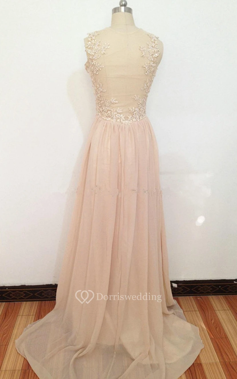Vestido largo de gasa con apliques de encaje y corte en A, con espalda transparente. view 2