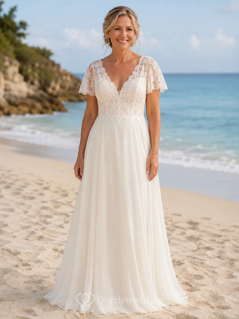 Robe de mariée trapèze en mousseline et dentelle, corsage en dentelle, idéale pour les mariées plus âgées.