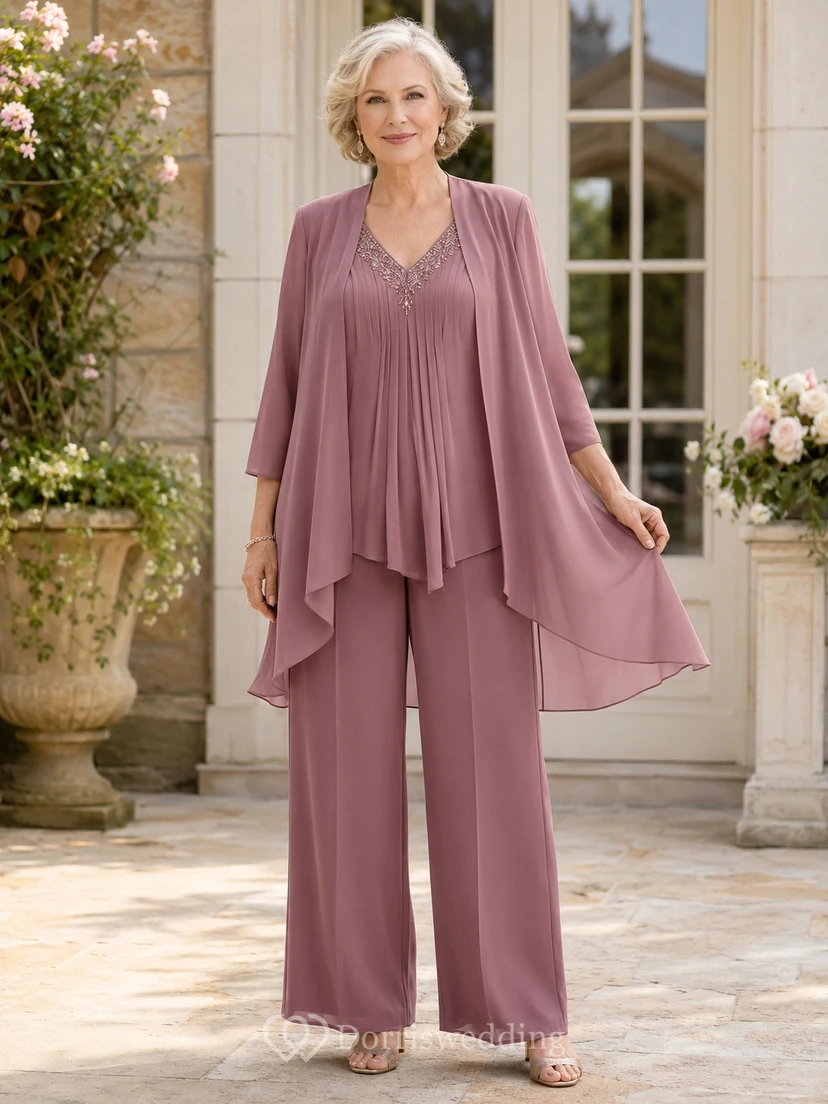 Vintage-Hosenanzug in Mauve-Tönen, schmeichelhaft für die Apfelfigur, romantisches Design, weites Bein, plissierter V-Ausschnitt, Dreiviertel-Schnitt, asymmetrische Tunika, bodenlange Hose