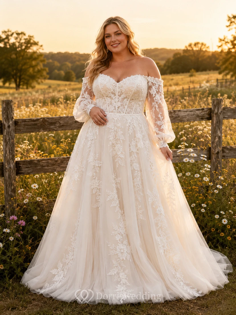Robe de mariée champêtre en tulle et dentelle, coupe trapèze, épaules dénudées, manches longues, traîne chapelle