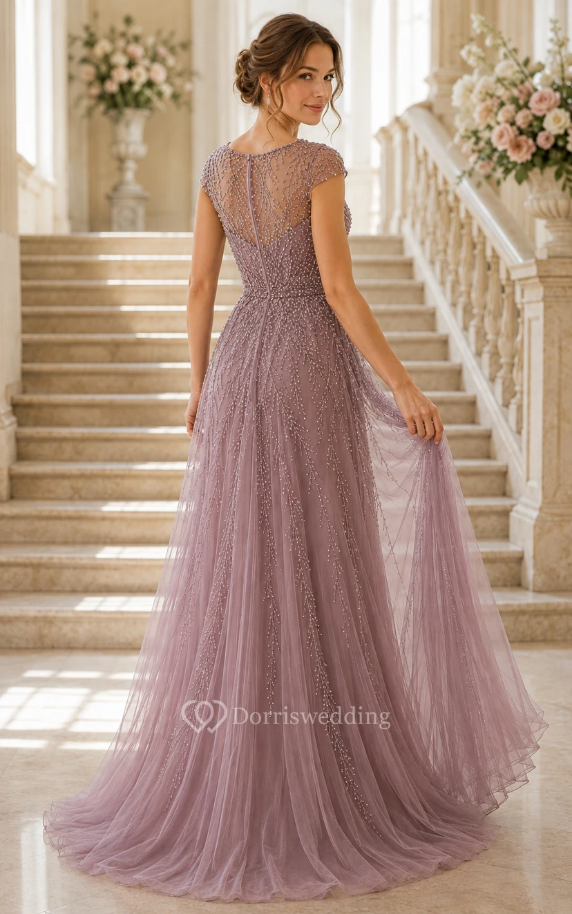 Robe de mariée mauve à manches courtes illusion en tulle perlé, coupe trapèze, avec traîne. view 2