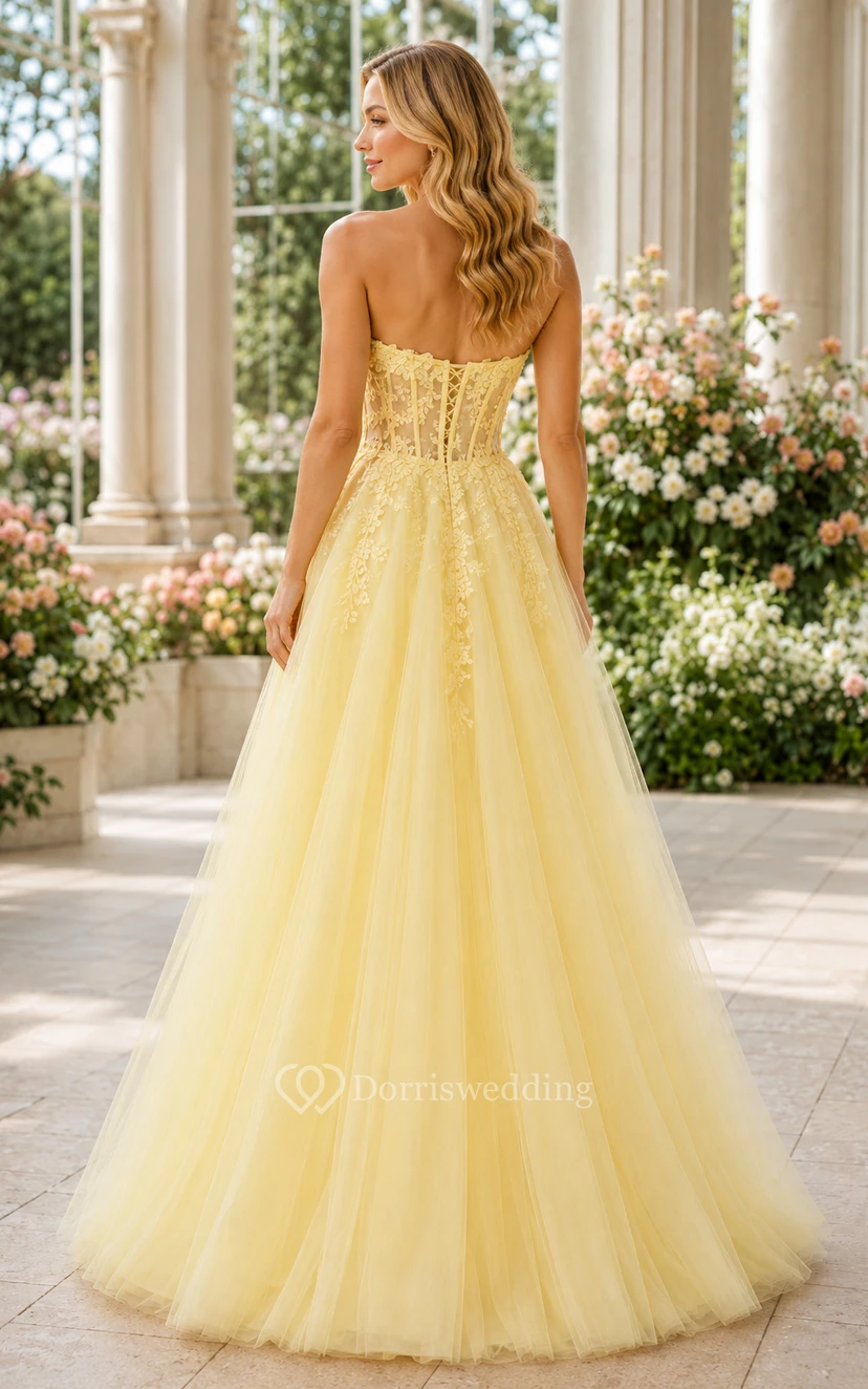 Vestido de fiesta de gala sin tirantes de tul color narciso con corpiño de apliques florales view 2